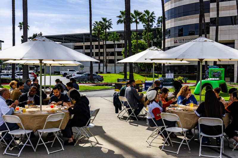 How to have a company picnic in the parking lot with food and games