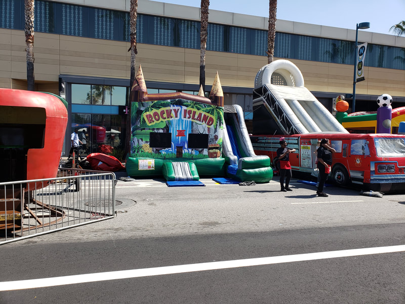 Inflatables and Rides at the Vegan Street Fair.