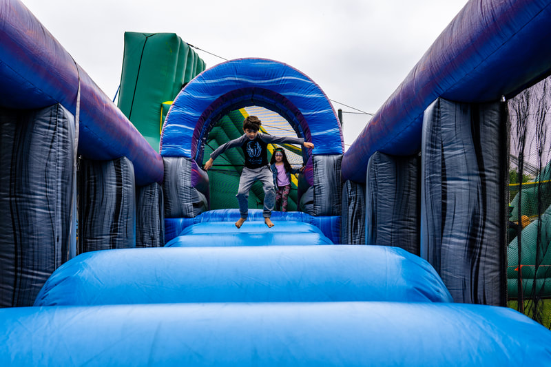 inflatable obstacle courses competitions for company picnics corporate events