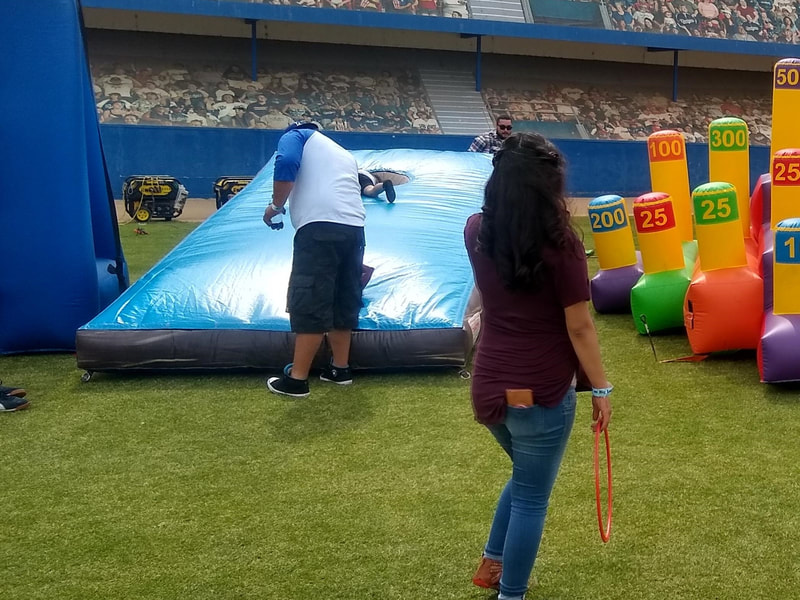 giant inflatable cornhole game rental for company picnics and corporate events