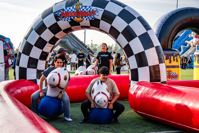 Mega Rally Raceway for Big Tricycles Hippity Hoppity Inflatable Horses Rental Los Angeles